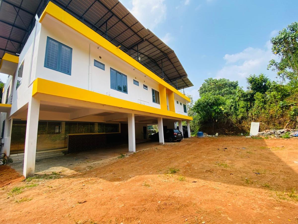 Erumely Central Homes Mundakayam Exterior photo